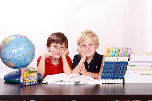 Boys doing homeschooling