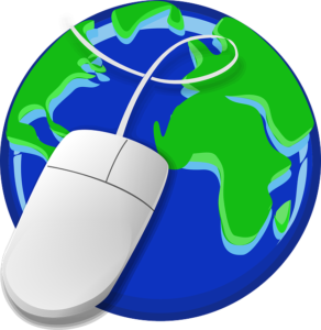 A computer mouse on top of a globe