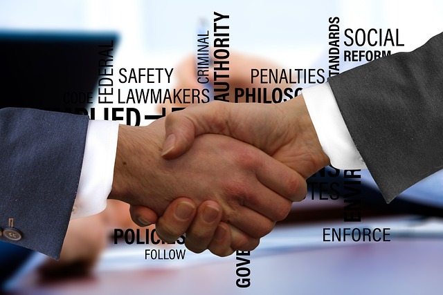 Graphic of two people shaking hands in front of words about legal issues